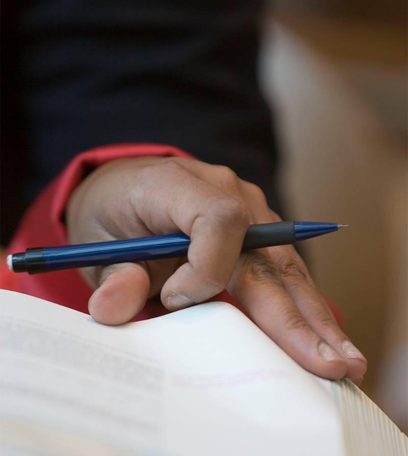 Student using textbook