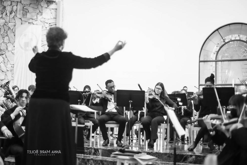 Dr. Richardson conducting at orchestra concert